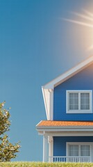 Obraz premium A charming house surrounded by lush greenery under a clear blue sky creating a welcoming atmosphere