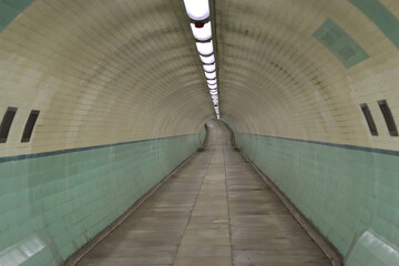 Underground pedestrian and cycle tunnel beneath a river