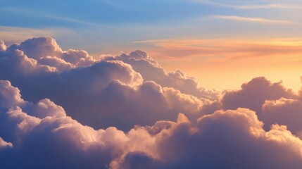 Serene sunset over fluffy clouds, casting warm hues in the sky, evoking tranquility and peace