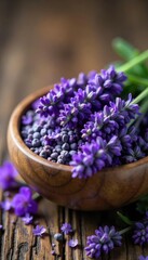 Fototapeta premium Aromatic lavender buds and flowers in a rustic wooden bowl, ready for use in aromatherapy or crafting Perfect for relaxation and natural beauty products , bath products, relaxation, calming