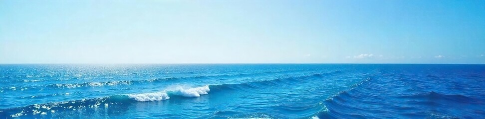 Fototapeta premium A breathtaking panoramic view of a vast, deep blue ocean stretching to the horizon, waves gently rolling under a clear sky Perfect for travel, nature, and serenity themes , vast, tide, landscape