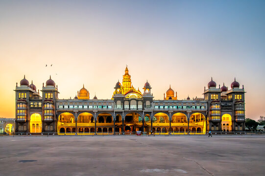 Mysore Palace illuminated at dusk in Mysuru, Karnataka, India