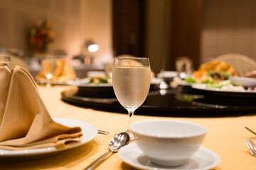 A glass of cool water sits on a table
