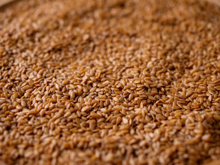 Obraz premium Organic golden flaxseed, linseed grains. Superfood high in fiber.