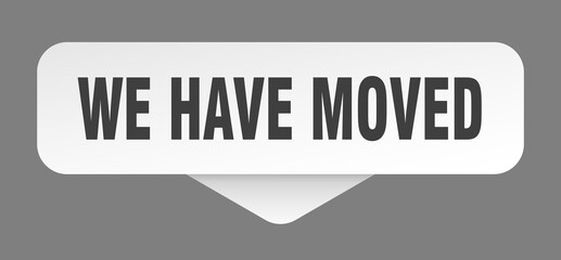 we have moved sticker. we have moved sign isolated on gray background