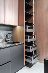 Modern Kitchen with Pull-Out Pantry and Dark Gray Cabinets