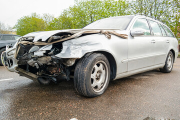 Front Part of Damaged Gray Car Crashed Broken in Road Traffic Accident  Placed Separately.