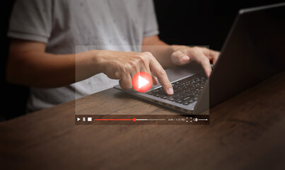 Watching online video is now embedded in everyday life. A man watches videos from his laptop computer for entertainment, including streaming movies, live shows, online lessons, and music