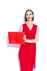 Positive Confident Caucasian Business Woman in Long Red Dress Posing With Red Folder Over White