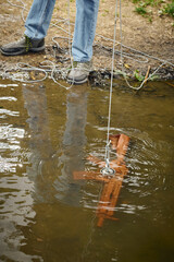Senior citizen fishing with magnet in city lake found guns