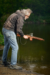 Senior citizen fishing with magnet in city lake found guns