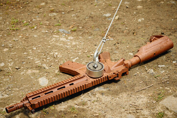 Senior citizen fishing with magnet in city lake found guns