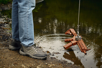 Senior citizen fishing with magnet in city lake found guns