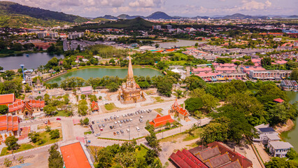 A drone aerial view of Wat Chalong is the most important temple of Phuket, Thailand.  and 1 of 5 must come in the afternoon