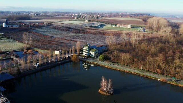 Scenic aerial view of Ub, Serbia showcasing tranquil landscapes, serene waters, and rural surroundings in the early morning light