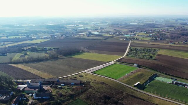 Aerial view of Ub, Serbia showcasing green fields and rural landscapes in clear sunny weather