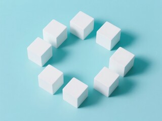 Obraz premium Eight White Cubes Arranged in a Circle on a Light Blue Background