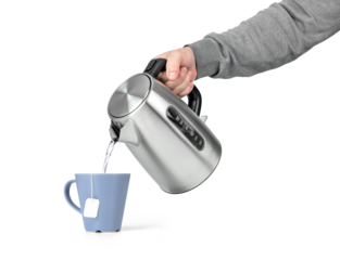 A hand pours hot water from a modern stainless steel electric kettle into a blue cup with a tea bag, isolated on a transparent background png.