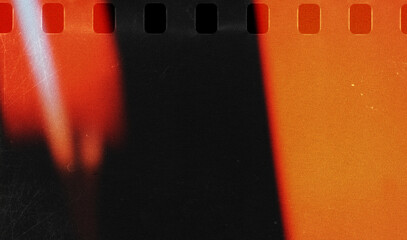 vintage film strip with orange edges and faded texture, perfect for retro designs, photo overlays,...