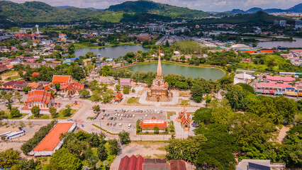 A drone aerial view of Wat Chalong is the most important temple of Phuket, Thailand.  and 1 of 5 must come in the afternoon