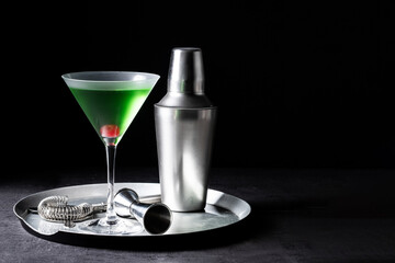 Japanese slipper cocktail on black background. Copy space