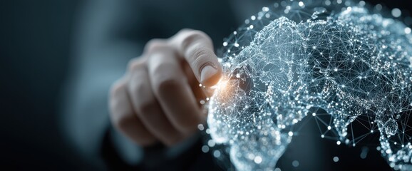 Hand interacting with digital world map.