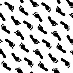 Human Black Footprints Repeating on White Surface