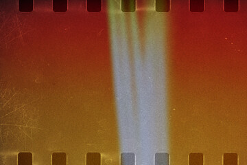 Film stripe black background with red light leaks, broken color tone. Dusty scratched and scanned old film texture.