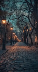 Cobblestone street at twilight, lined with trees and vintage lamps
