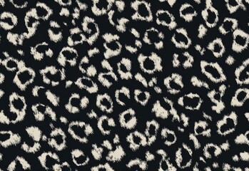 Abstract black and cream animal print pattern.