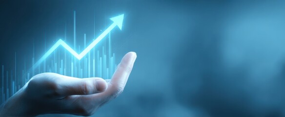 The hand supporting an upward trend in business growth and analytics.