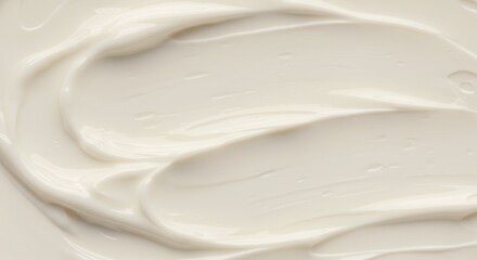 Obraz premium Smooth Creamy Texture Close-Up of Luxurious Lotion or Cream