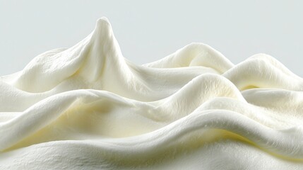 Obraz premium Textured White Cream Swirls Against Gray Background
