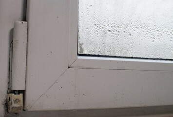 the fogged window. drops on the window glass