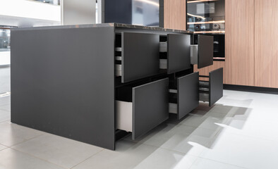 modern huge built-in kitchen with upper and lower cabinets, shelves, drawers. wooden and gray kitchen facades, gray marble countertop. built-in kitchen appliances, large kitchen island with drawers.
