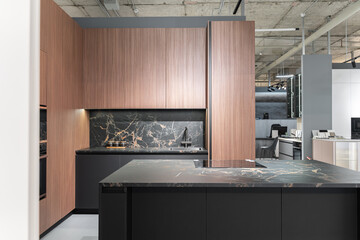 modern huge built-in kitchen with upper and lower cabinets, shelves, drawers. wooden and gray...