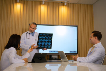 Group of doctors are meeting at hospital.