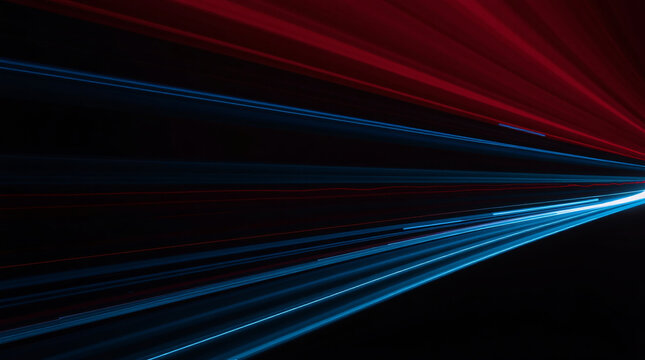 Vibrant red and blue light beams creating a dynamic, futuristic abstract design.
