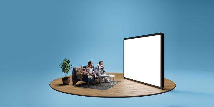 Couple with child sitting on couch at home and looking at 3D model of giant tablet with blank screen. Composite image. Collage. Concept of media, family, movie night, news, announcement