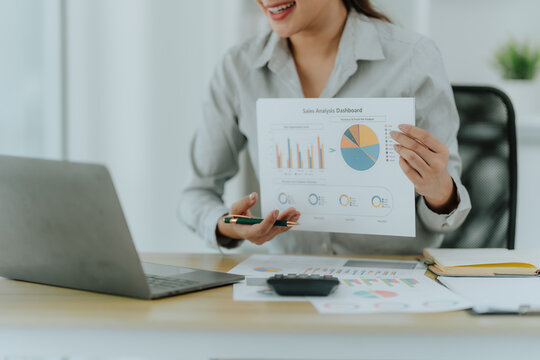 Businesswoman Presenting Financial Data Chart
