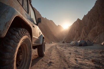 Off-road vehicle parked in a desert camping area at sunset, surrounded by majestic mountains and tents, creating a sense of adventure and exploration in nature's embrace.