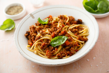 Spaghetti Bolognese with fresh basil	
