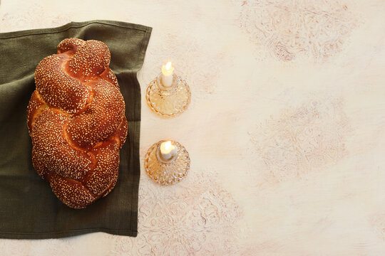 Image of Shabbat, challah bread, wine and candles