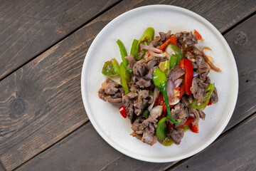 chicken gizzard in chinese style oyster sauce with green and red bell pepper
