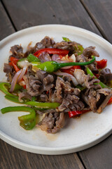 chicken gizzard in chinese style oyster sauce with green and red bell pepper