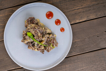 chicken gizzard in chili coconut cream 