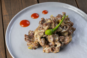 chicken gizzard in chili coconut cream 