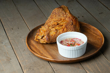 a delicious famous dish in the Philippines, deep fried pork leg also known as crispy pata 