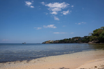 a breath taking shoreline at Batangas; Houses by the cliff
