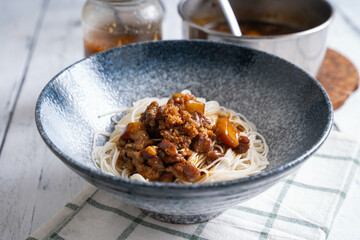 marinated ground pork in dried egg noodles